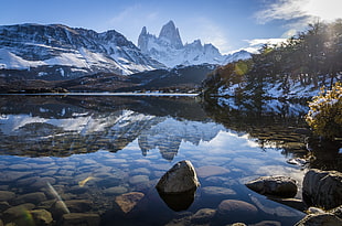 silent body of water beside trees under cloudy blue sky, fitz roy, argentina HD wallpaper