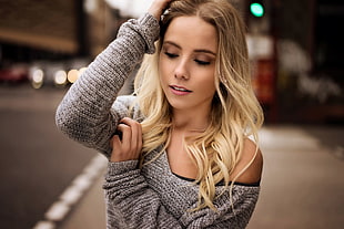 blonde haired woman in gray sweater in tilt shift photography HD wallpaper