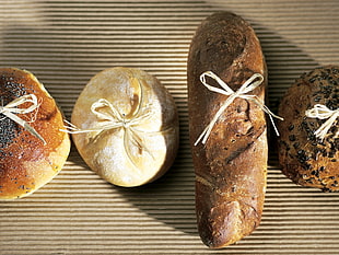 close up photography og four baked breads HD wallpaper