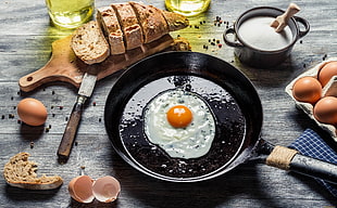 black frying pan with fried egg HD wallpaper