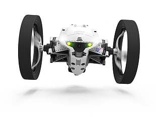 photo of white and black quadcopter toy