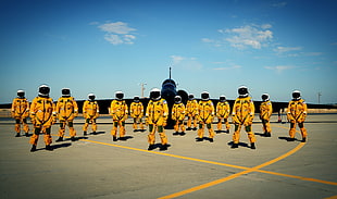 yellow astronaut gear, pilot, airplane, jet fighter, aircraft