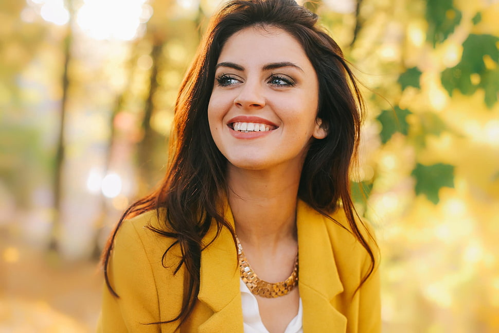 selective focus photography of woman wearing yellow notched lapel blazer HD wallpaper