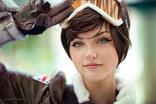 woman in brown leather jacket