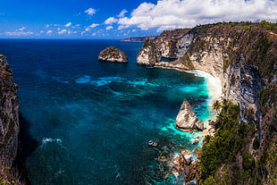 rock formation near body of water