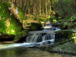 waterfall between rock formation