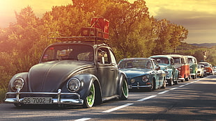 photo of inline cars on asphalt road HD wallpaper
