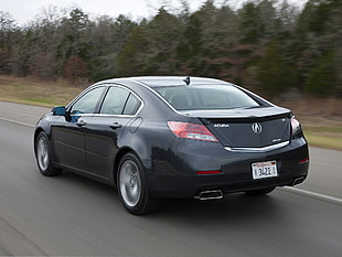 close up photography of black Acura sedan