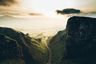 black and brown rock formation, landscape, clouds, sunset, trees