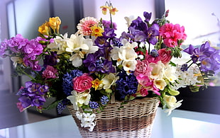 variety of flowers in basket at table HD wallpaper