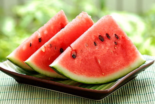 three sliced watermelon on brown plate HD wallpaper