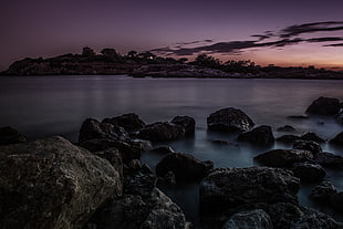 ocean and mountain view during sunset photo