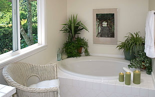 three green pillar candles on white ceramic bathtub HD wallpaper