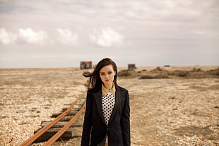 woman in black coat