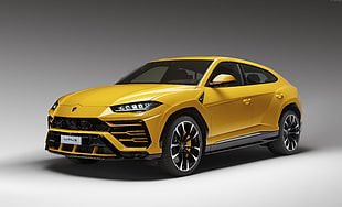 yellow Lamborghini Urus HD wallpaper