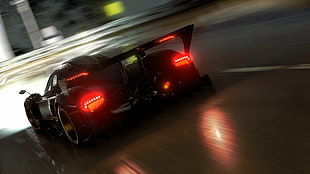black hyper car on road during night time HD wallpaper