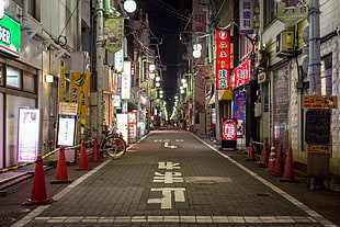 orange plastic traffic cone lot, Japan, road, night, street