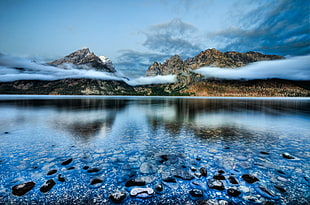 photo of body brown mountain with body of water, jenny lake