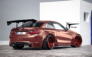 brown sports coupe with spoiler HD wallpaper