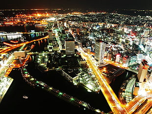 black and red computer motherboard, lights, road, building, horizon