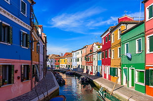 boats in the creek near buildings, venice, italy