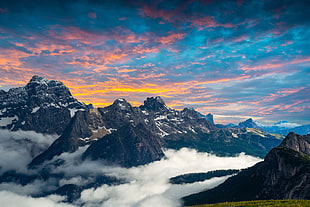 mountain range covered in clouds HD wallpaper