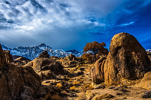 rock formations under cloudy sky during daytime