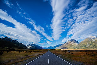 gray road with brown mountains landscape photo HD wallpaper