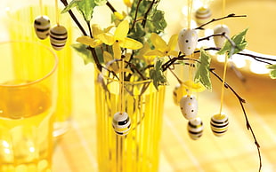 yellow petaled flowers on vase