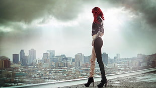 low light photo of woman wearing black jacket and pants HD wallpaper