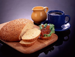 photography of sliced bread on plate