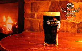 black and white Guinness labeled container, Guinness, beer, alcohol, fireplace HD wallpaper