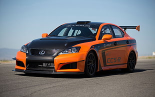 orange and black Lexus CCS-R sedan on road during daytime