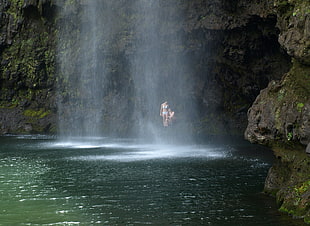 gray stone and body of water