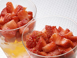 strawberry fruit in clear drinking glass