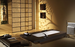 bathtub inside room near towels on rack HD wallpaper