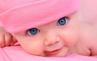 baby wearing pink beanie photo HD wallpaper