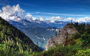 panoramic photography of mountains under blue sky