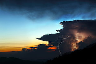 silhouette photo of stormy clouds