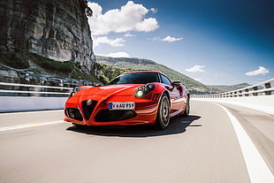 red Alfa Romeo luxury car HD wallpaper