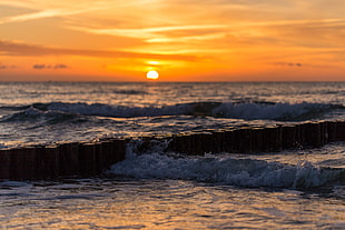 ocean waves during sunset