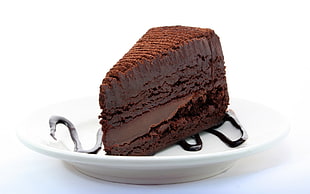 sliced brown chocolate cake on plate HD wallpaper