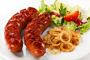 two cooked sausage with vegetables HD wallpaper