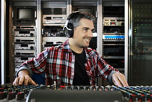 man with headphones using audio mixer HD wallpaper