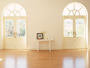 white console table in the middle of white painted wall in between two 2-door windows HD wallpaper