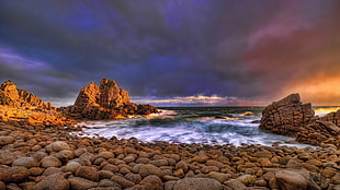 brown rock formation, coast, stones, sea, clouds HD wallpaper