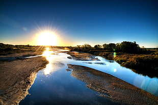 body of water and brown open field under blue sky during sunset, canadian river HD wallpaper