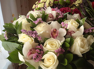 white Rose and purple Statice flower bouquet