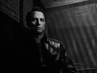 grayscale photo of man in leather jacket HD wallpaper