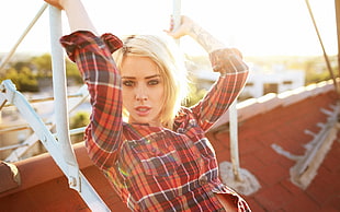 woman wearing plaid blouse